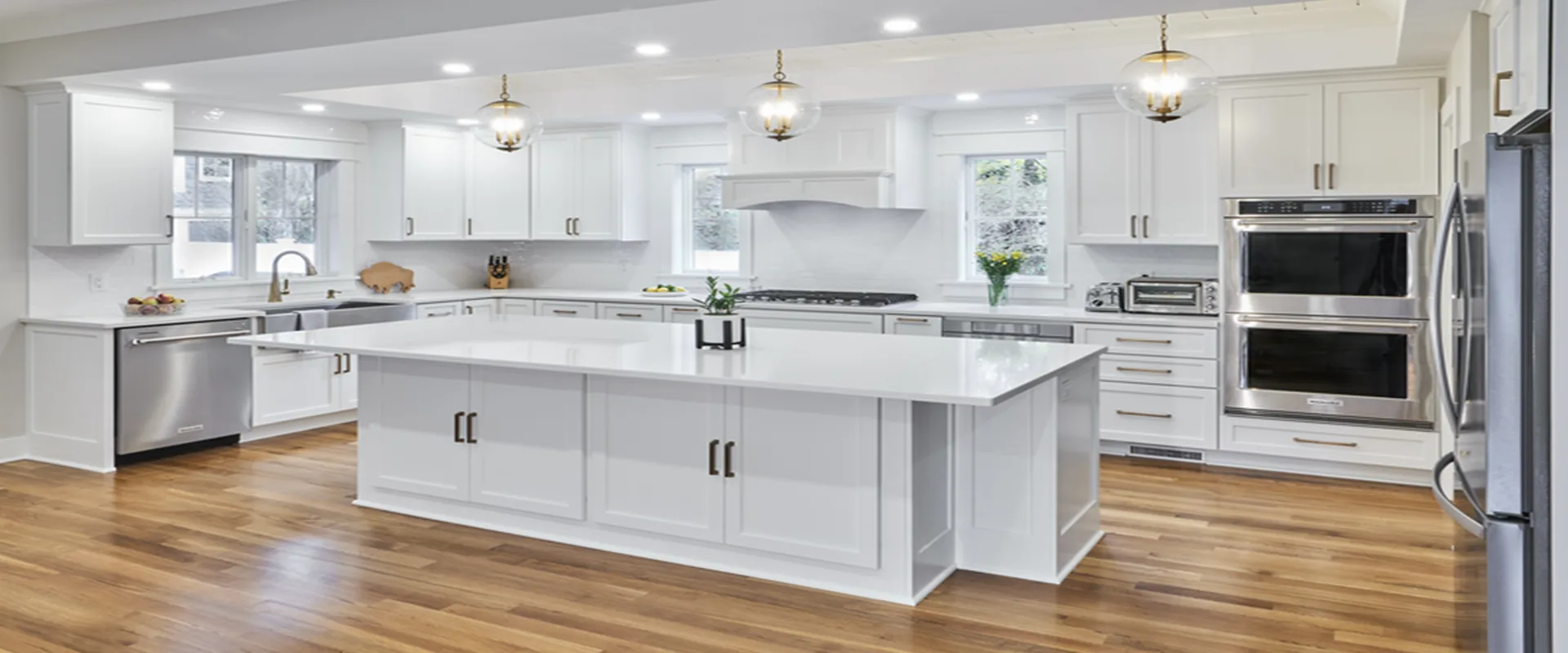 White shaker kitchen, brass accents