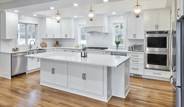 Open white kitchen + island