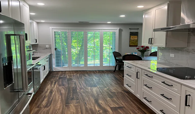 Open white kitchen + island